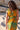 Vestido Prana maxi seda sari reciclado verde e amarelo padrão floral fenda lateral borlas Raja Pura - vista retrato costas