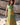 Vestido Prana maxi seda sari reciclado verde e amarelo padrão floral fenda lateral borlas Raja Pura - vista corpo inteiro frente