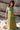 Vestido Prana maxi seda sari reciclado verde e amarelo padrão floral fenda lateral borlas Raja Pura - vista corpo inteiro frente