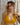 Top Boondi yoga halter viscose algodão amarelo mostarda nó central pendente dourado Raja Pura - vista de frente