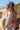 Top Indra étnico halter algodão areia bordado geométrico tribal Raja Pura - vista retrato 3/4