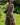 Vestido Kali maxi étnico seda padrão tribal mandala tons de castanho decote halter Raja Pura - vista corpo inteiro 3/4