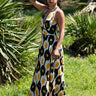 Vestido Kali maxi étnico seda padrão tribal mandala preto, branco e amarelo decote halter Raja Pura - vista corpo inteiro lado 3/4