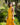 Vestido Priya maxi étnico cor amarelo algodão gola enrolada Raja Pura - vista corpo inteiro lado